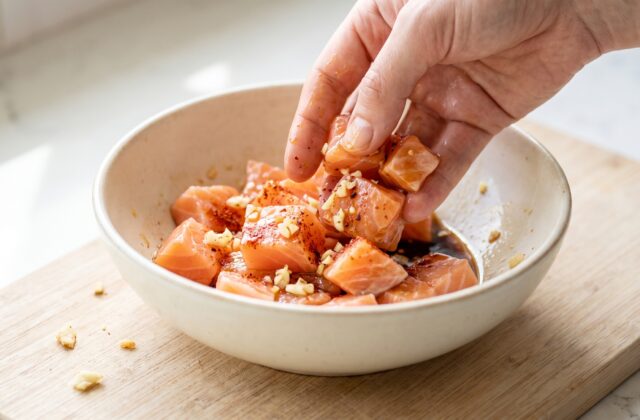 Air Fryer Salmon Bites — Season the bites